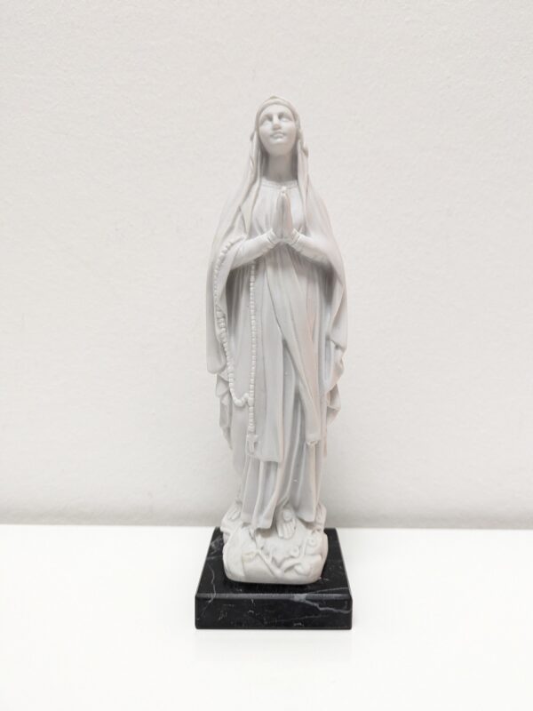 Statue of Our Lady of Lourdes in marble dust